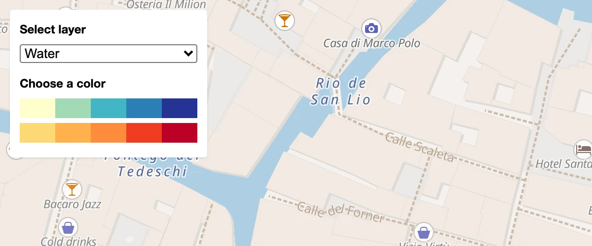 Use setPaintProperty to change a layer's fill color.